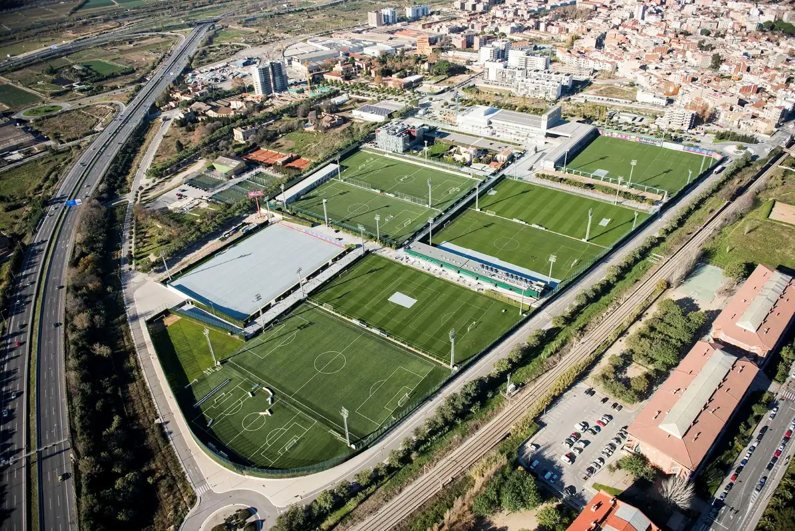 Aerial view of sports complex with fields.